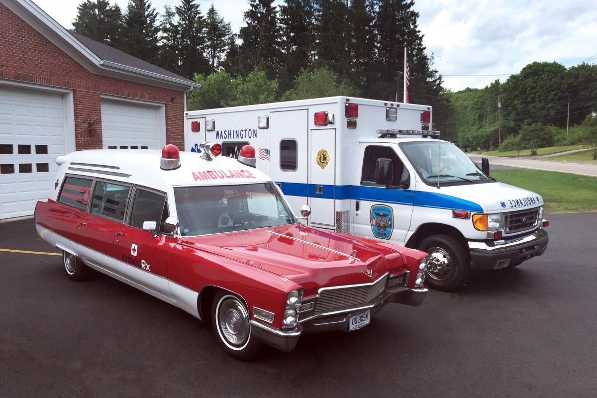 Vintage and modern ambulance parked nect to each other
