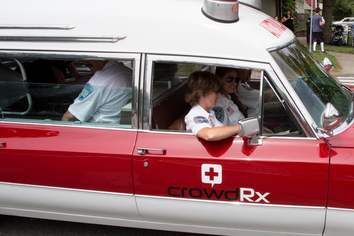 Memorial Day Parade 2016 - closeup of pasengers in passenger seat and back set of vintage ambulance