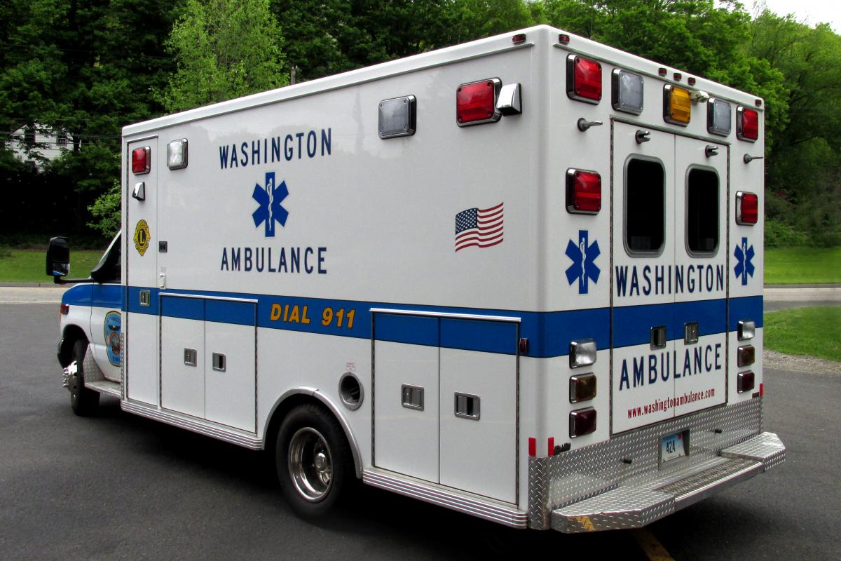 Side view of modern ambulance taken from left rear